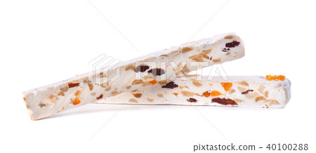 Nut nougat with dried fruit, sweet candy isolated on white background Nut nougat with dried fruit, sweet candy isolated on white background 40100288