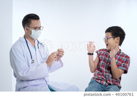 doctor holding syringe with injection vaccination doctor holding syringe with injection vaccination 40100761