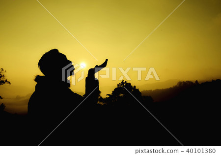 man giving a kiss during sunrise man giving a kiss during sunrise 40101380