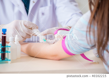 Patient during blood test sampling procedure taken for analysis 40102215