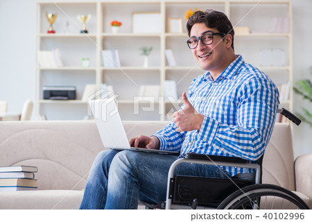 Young student on wheelchair in disability concept 40102996