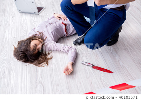 Forensic investigator at the crime scene investigating woman mur Forensic investigator at the crime scene investigating woman mur 40103571