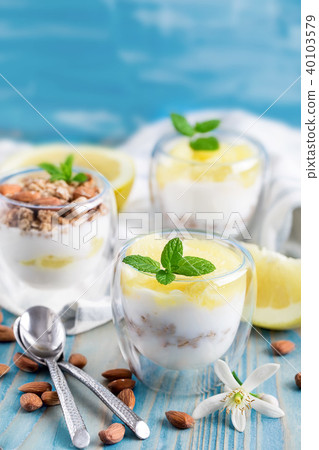 Yogurt with granola and grapefruit background 40103579