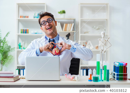 Funny doctor having fun in hospital lab Funny doctor having fun in hospital lab 40103812