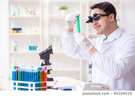 Chemist working on cannabis extract for medical purposes 40104819