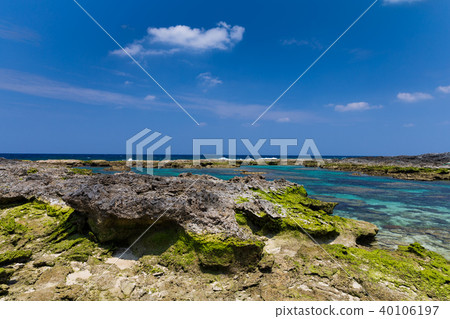 An uplifting coral reef island with a limestone coastline of coral origin An uplifting coral reef island with a limestone coastline of coral origin 40106197