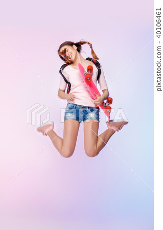 beautiful woman with skate in studio 40106461