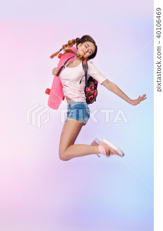 beautiful woman with skate in studio beautiful woman with skate in studio 40106469