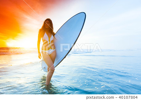 Woman with surfboard Woman with surfboard 40107804