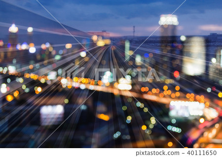Night twilight city blurred bokeh light over train 40111650