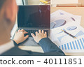 businessman typing laptop or notebook chart paper 40111851