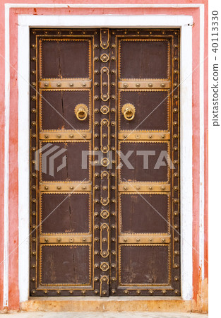 Antique rustic ancient wooden door. 40113330