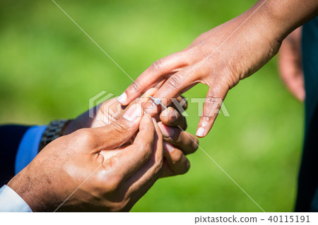 Engagement ring proposal hands close up Engagement ring proposal hands close up 40115191