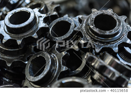 Background made of black spur gears or cogwheels 40115658