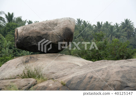 Balancing on Rock Bed 40125147