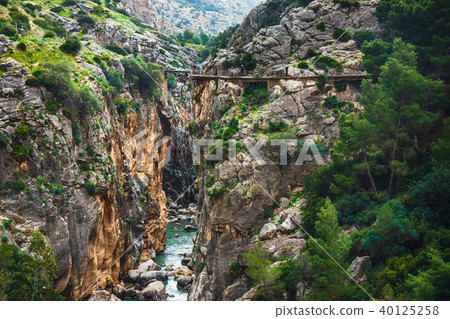 Caminito Del Rey, mountain path along steep cliffs Caminito Del Rey, mountain path along steep cliffs 40125258