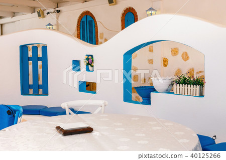 Empty greek tawern in the garden, Crete, Greece Empty greek tawern in the garden, Crete, Greece 40125266