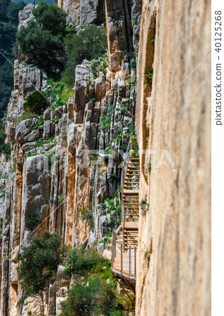 Caminito Del Rey, mountain path along steep cliffs Caminito Del Rey, mountain path along steep cliffs 40125268