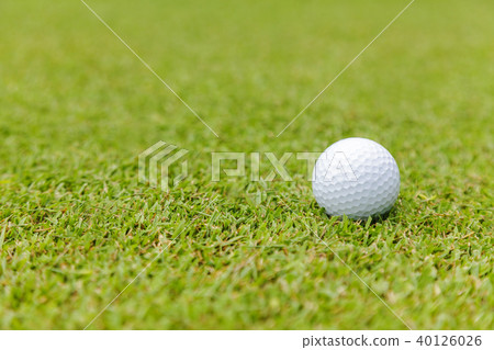 Golf ball on green grass on golf course 40126026