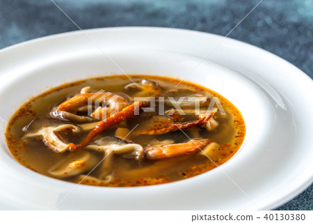 Portion of thai tom yum soup Portion of thai tom yum soup 40130380