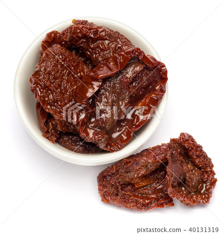 Canned Sundried or dried tomato halves in ceramic bowl 40131319