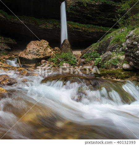 Upper Pericnik waterfall in Slovenian Alps in autumn, Triglav National Park 40132393