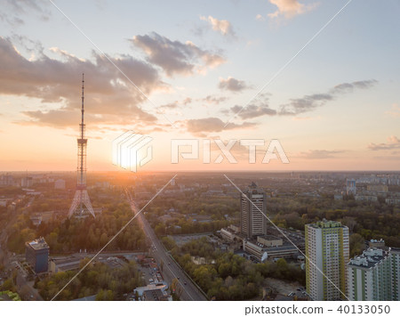 view of the city of Kiev with Dorogozhychi distric with a TV tower on sunset 40133050