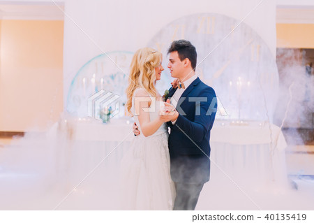 Happy bride and groom gracefully dance. Wedding celebration Happy bride and groom gracefully dance. Wedding celebration 40135419