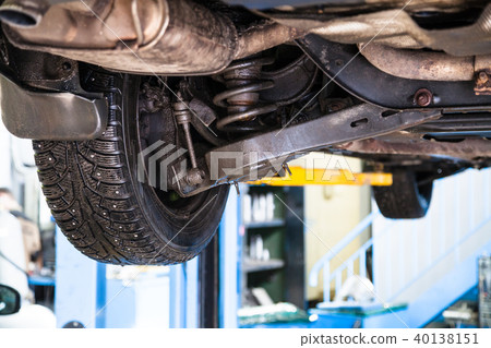 bottom view of wheel and shock absorber of vehicle bottom view of wheel and shock absorber of vehicle 40138151