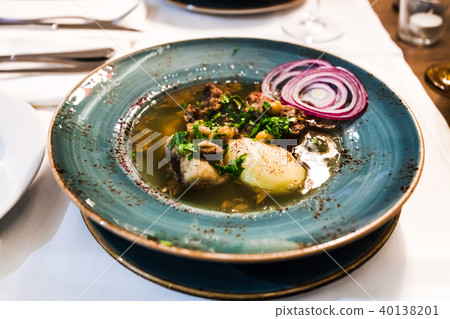 traditional caucasian soup Putuk (Piti) in plate 40138201