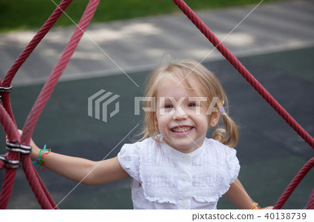 Happy child in a playground 40138739