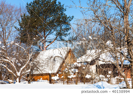 new wooden cottage in russian village in winter 40138994