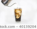 milk pour over ice coffee in white background 40139204