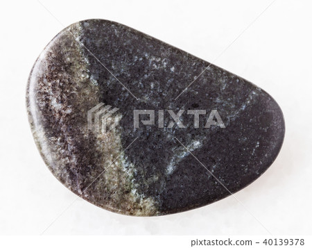 polished olivinite stone on white 40139378