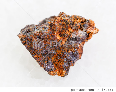 rough Hematite (iron ore) stone on white marble 40139534