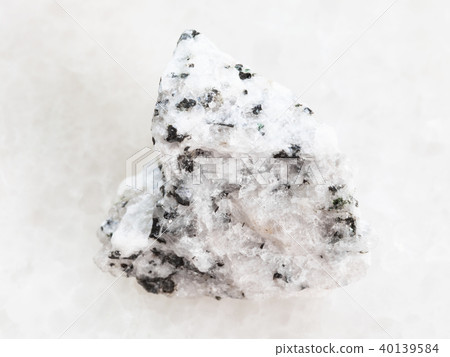 rough Diorite stone on white marble rough Diorite stone on white marble 40139584