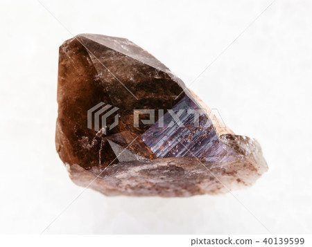 raw crystal of smoky quartz gemstone on white raw crystal of smoky quartz gemstone on white 40139599