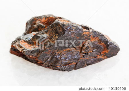 rough Wolframite stone (tungsten ore) on white 40139606