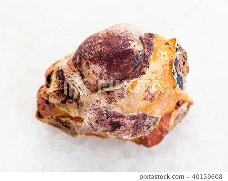 Bauxite stone on white marble 40139608