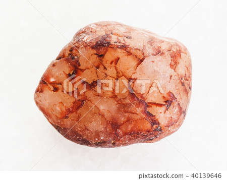 raw pink quartz stone on white marble 40139646