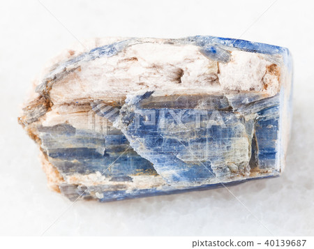 raw kyanite stone on white marble 40139687