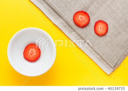 Three fresh slices of strawberry. 40139735