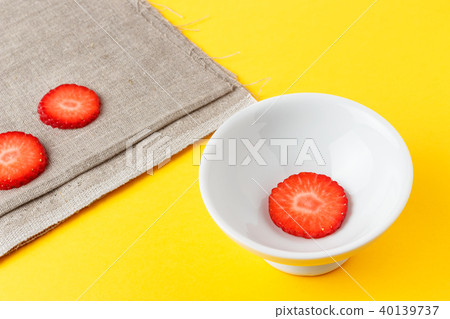 Three fresh slices of strawberry. Three fresh slices of strawberry. 40139737