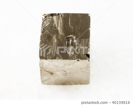 rough pyrite crystal on white marble 40139818