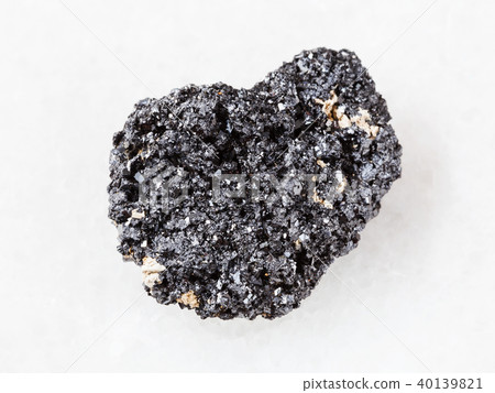 crystalline Perovskite stone on white marble crystalline Perovskite stone on white marble 40139821