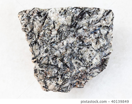 raw lujavrite stone on white marble raw lujavrite stone on white marble 40139849