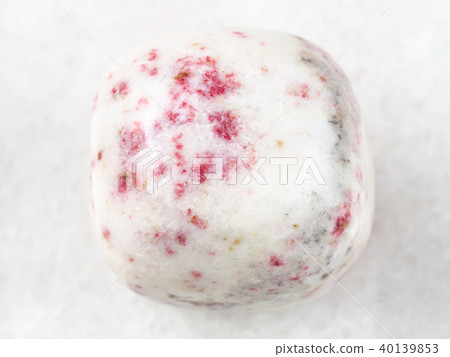 cinnabar in polished white dolomite stone on white 40139853