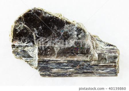 raw muscovite mica stone on white marble raw muscovite mica stone on white marble 40139860