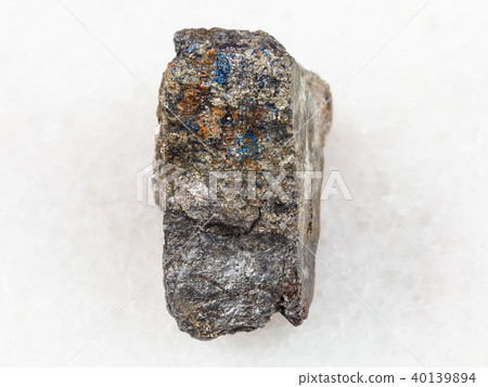 piece of Arsenopyrite stone on white piece of Arsenopyrite stone on white 40139894