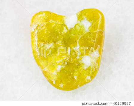 polished Lepidolite gemstone on white polished Lepidolite gemstone on white 40139937